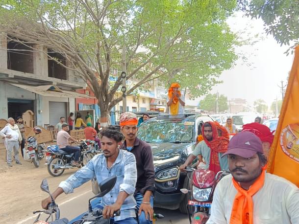 Young volunteers on bikes